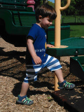 toddler boy in blue romper with back zipper side picture taken